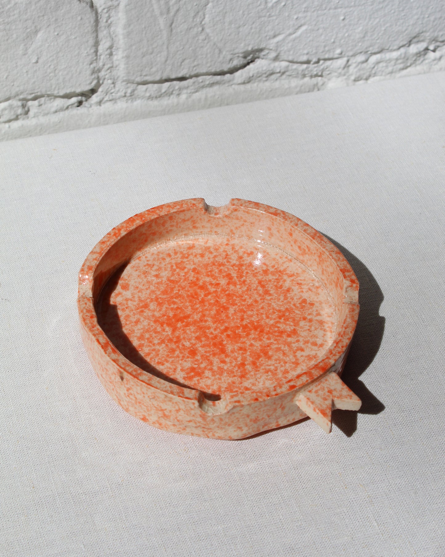 Stephen Michaels Ribbon Tip Ashtray in Orange Glaze