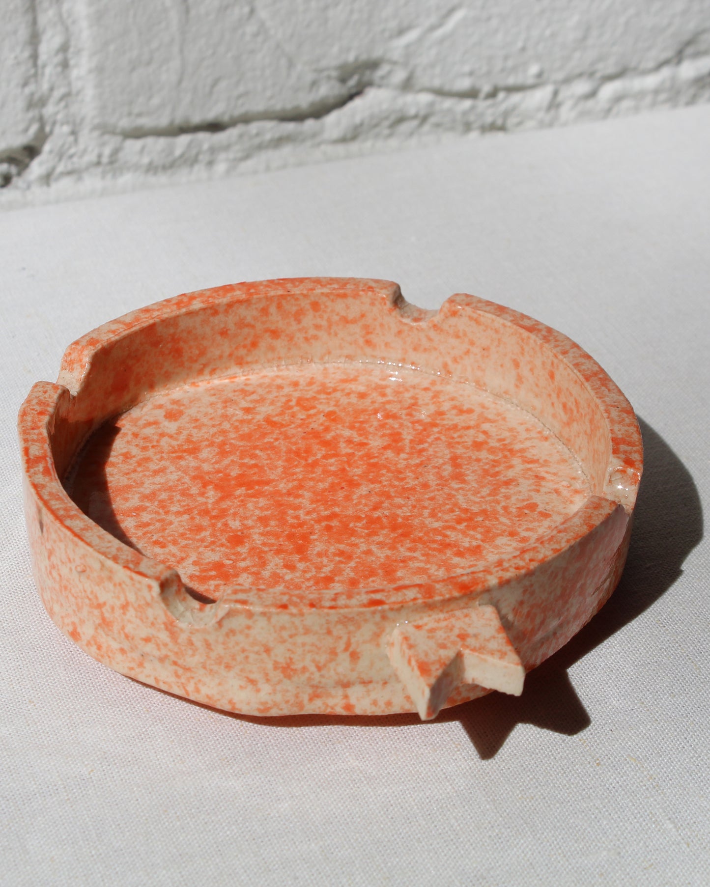 Stephen Michaels Ribbon Tip Ashtray in Orange Glaze