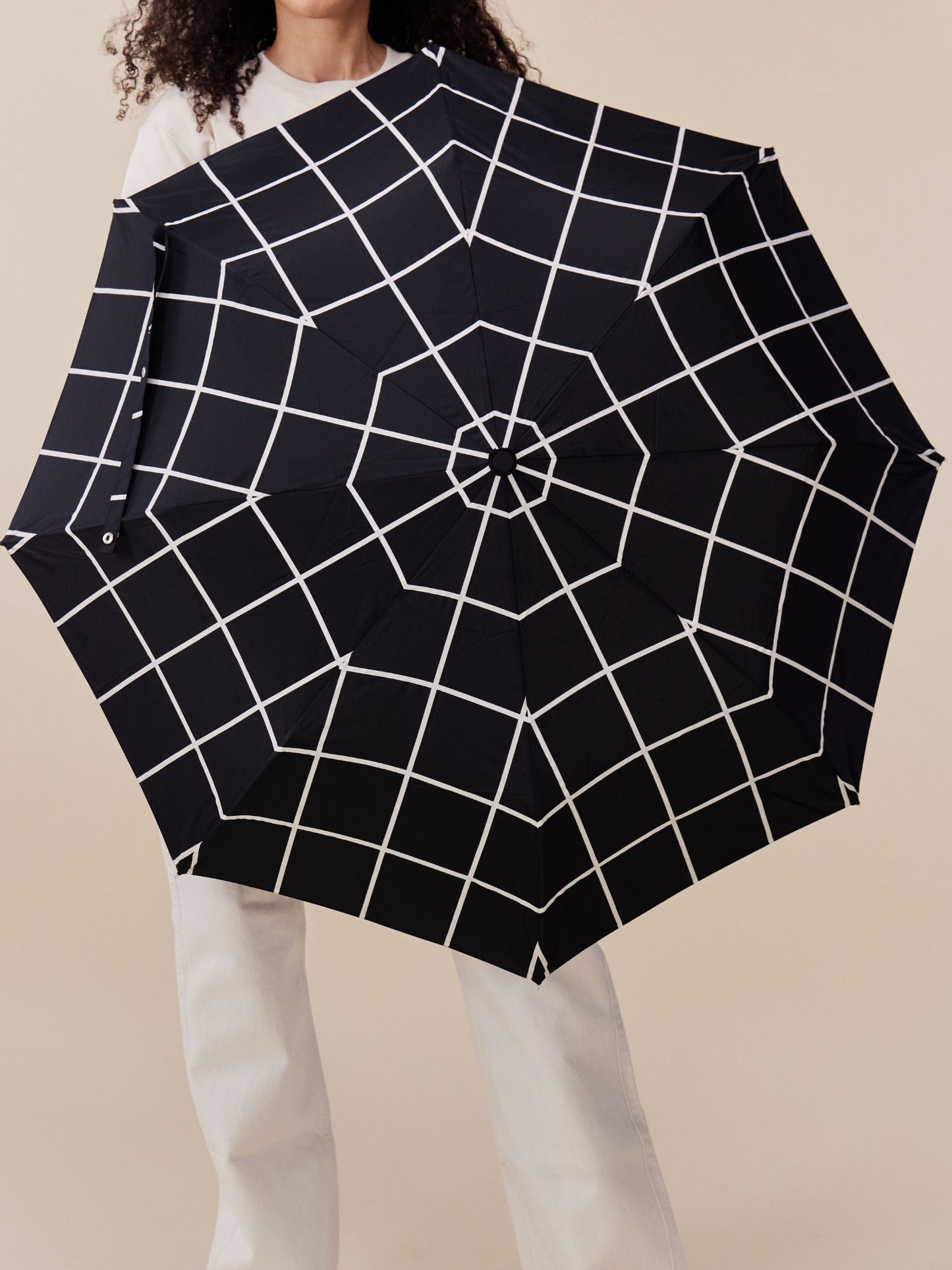 ORIGINAL DUCKHEAD Compact Umbrella in Black Grid available at Lahn.shop
