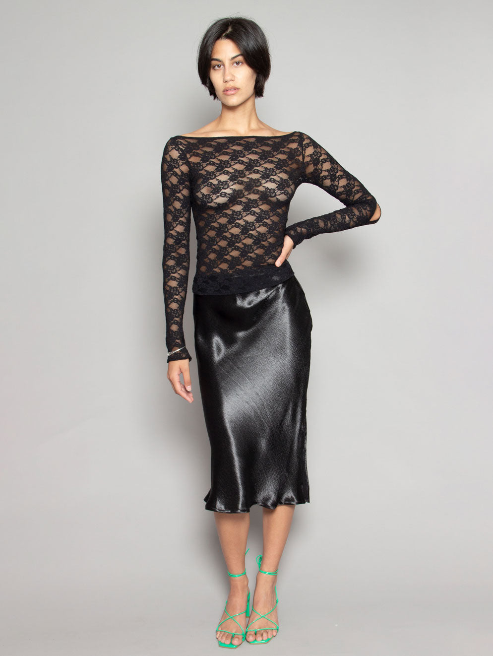 PERSONS Larsa Bias Slip Skirt in Noir available at Lahn.shop
