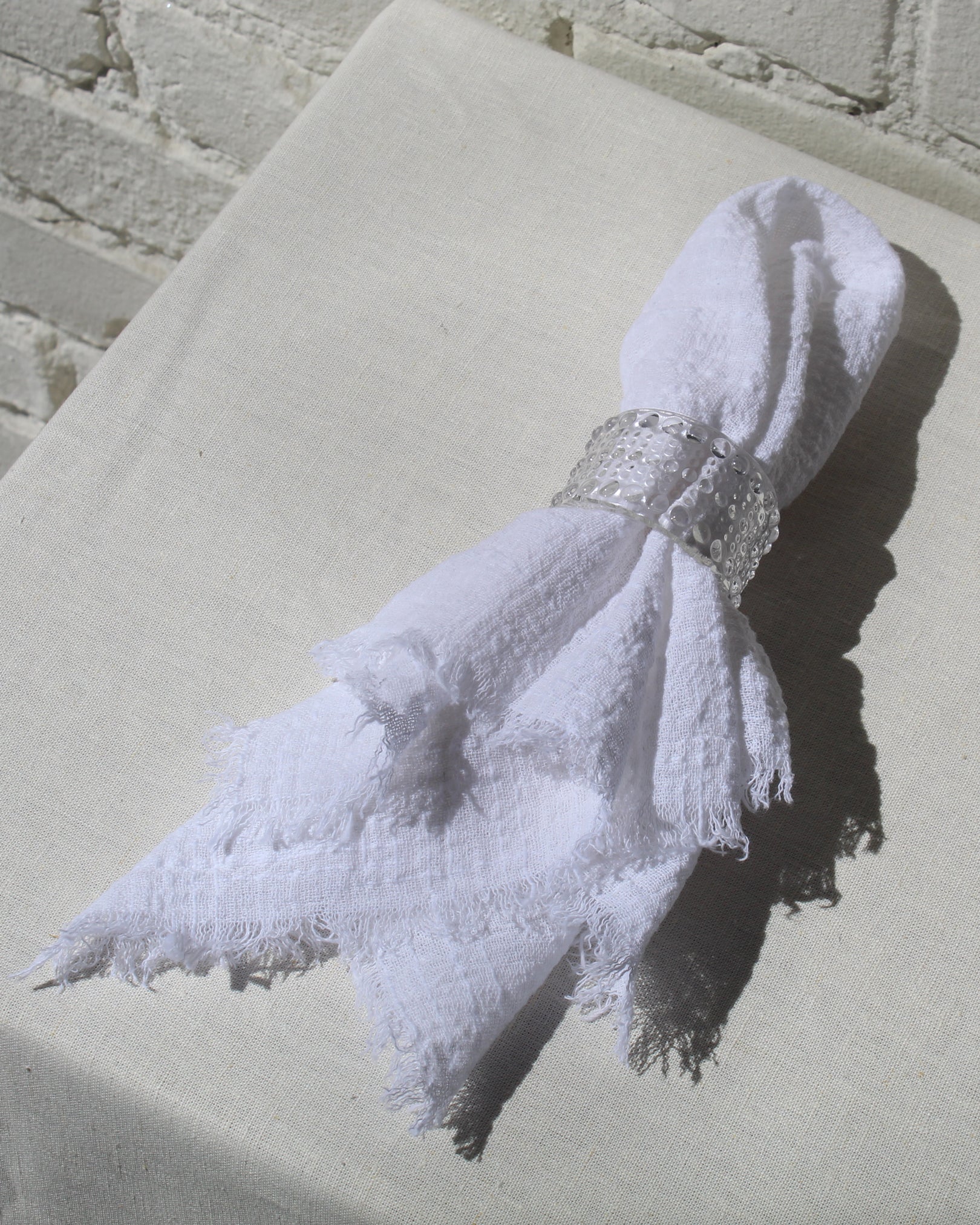 9 CHRISTOPHER Washed Linen Napkin in White available at Lahn.shop
