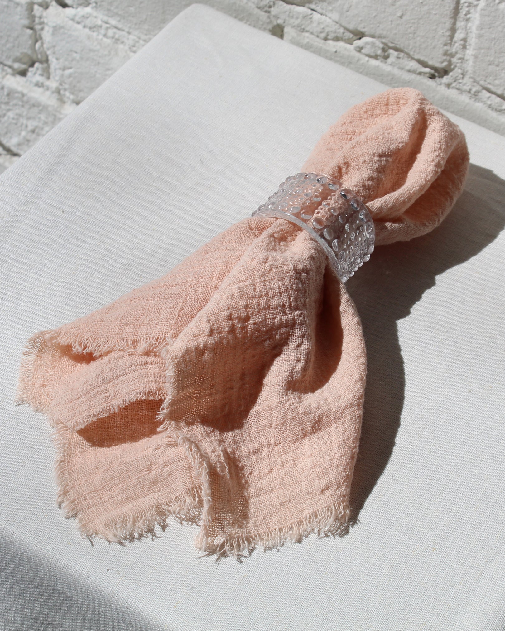 9 CHRISTOPHER Washed Linen Napkin in Peach available at Lahn.shop