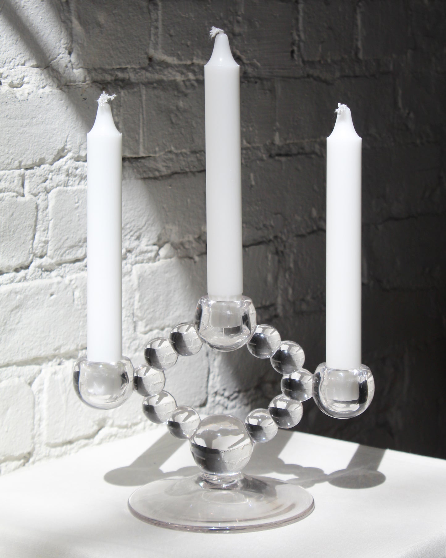 9 CHRISTOPHER Classic Taper Candle in White available at Lahn.shop