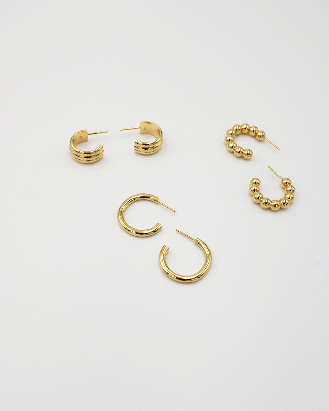 IDAMARI Lamé Hoop Earrings in Gold available at Lahn.shop