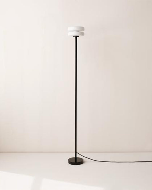 IN COMMON WITH Puck Floor Lamp in Black available at Lahn.shop